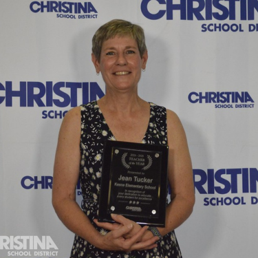 Photo of jean Tucker Keene ES Teacher of the Year with award